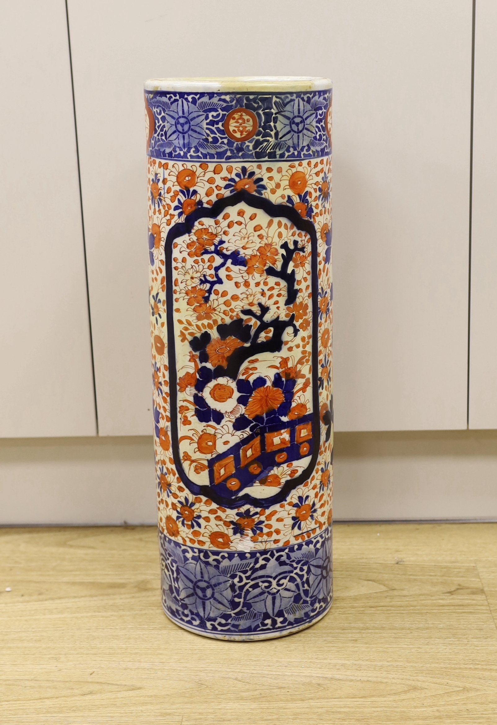 A Japanese Imari stickstand, 63cm (restored)